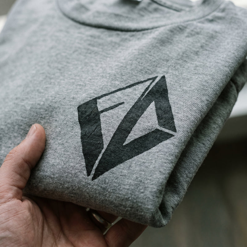 Screen-print detail on Taylored Merch tee