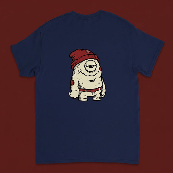 One Eye — Taylored Merch streetwear tee, oxblood studio flat-lay, navy back print