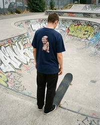 Sea Legs — Taylored Merch streetwear tee, navy, back print on model
