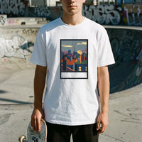 Window Seat framed cityscape — Taylored Merch heavyweight streetwear tee, front print on model